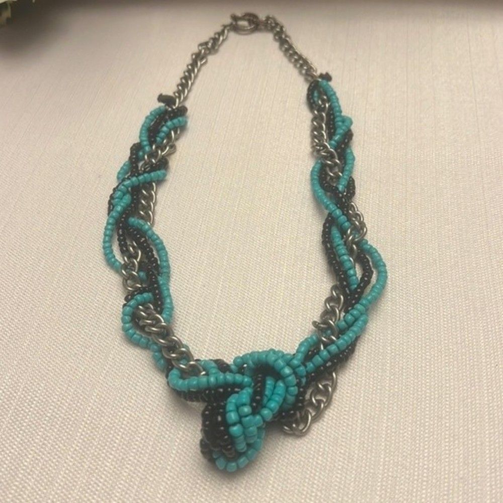 Handcrafted turquoise & black bead strands intertwined with silver tone chain.
